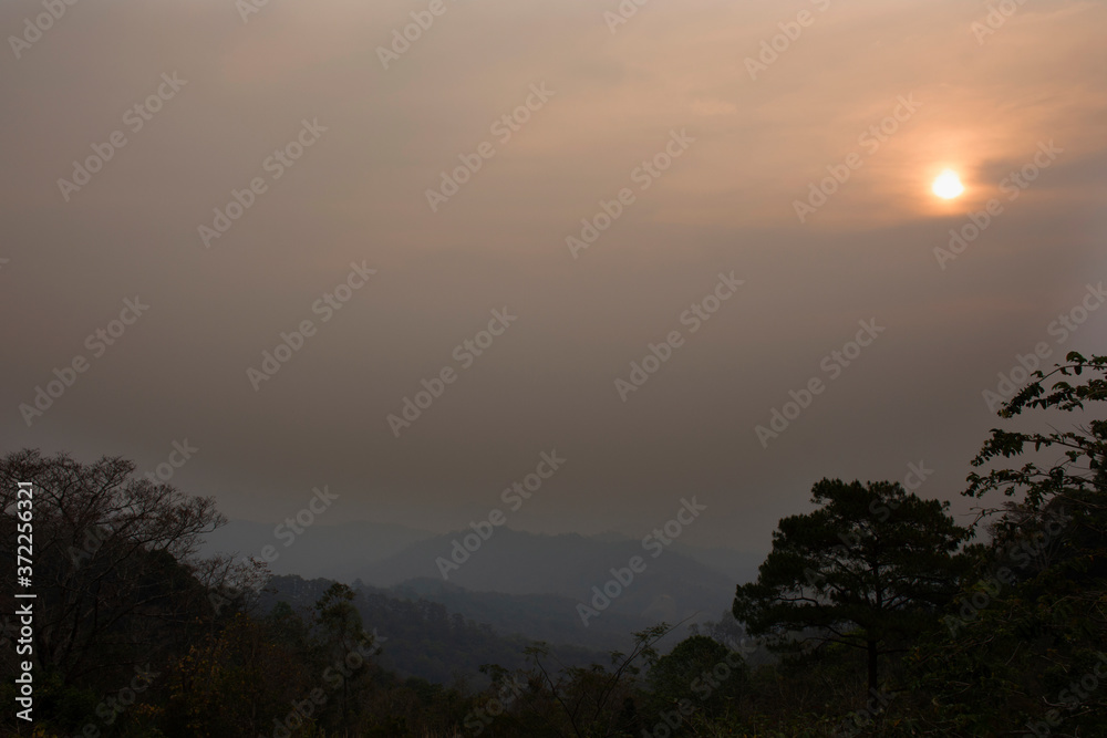 View landscape mountain and forest nation park with mist or fog at viewpoint of Doi Kiew Lom Scenic Point in Pang Ma Pha hill valley village city while PM 2.5 Dust situation at Mae Hong Son, Thailand