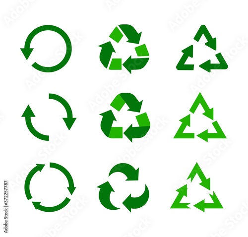 Set of triangular and round green vector recycle icons or signs or symbols.