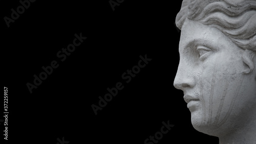 Ancient portrait statue of sensual royal Italian, Greek Renaissance Era woman isolated at black background with copy space for text