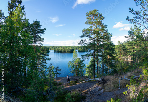 Summer lake scene at hiking trail in Teijo national park, Salo, Finland. Trees and the Matildajarvi lake. photo