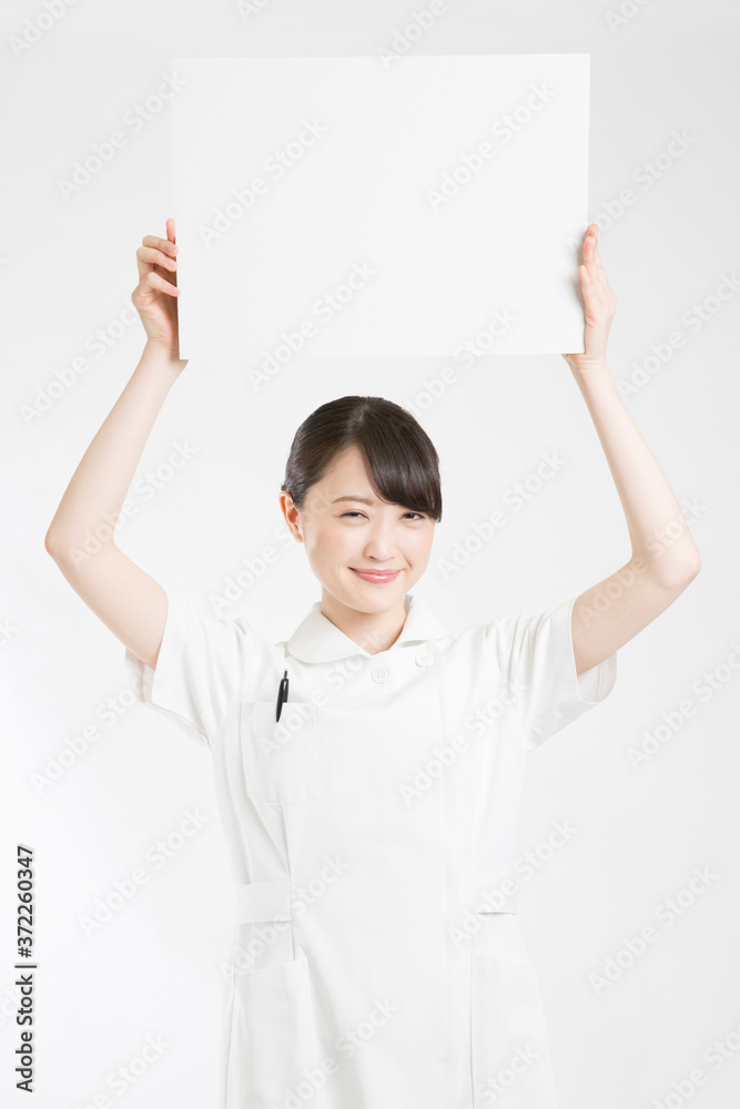 メッセージボードを持つ看護師 メッセージボードを持つ看護師