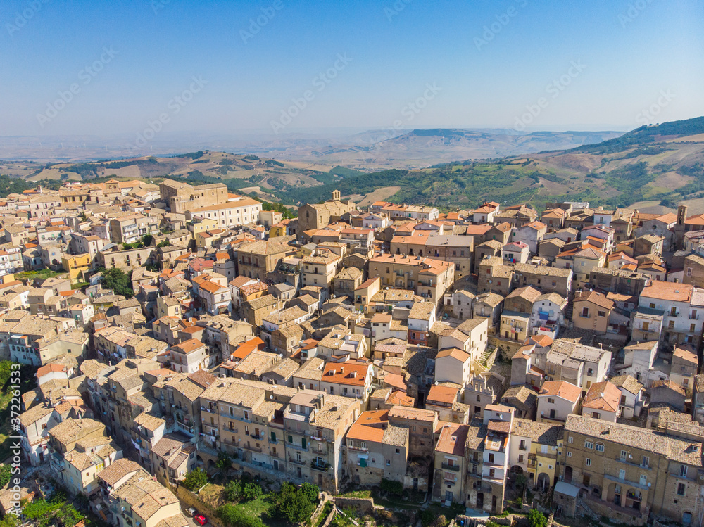 Tricarico town, province of Matera, Basilicata, southern Italy. It is home to one of the best preserved medieval historical centres in Italy. aerial view of tricarico with its Norman tower