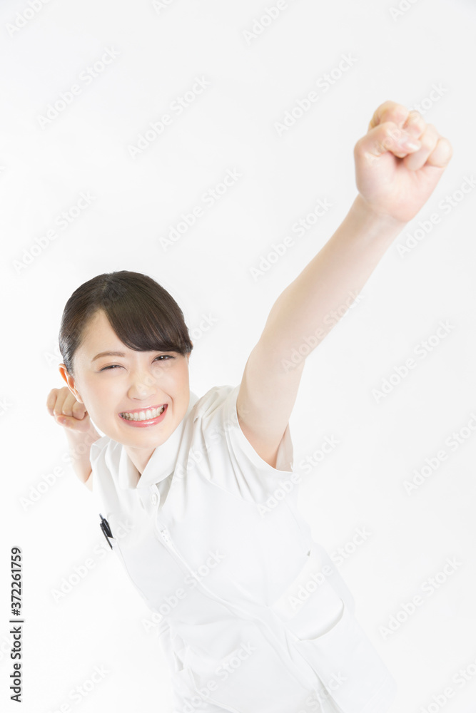 ガッツポーズをする看護師 ガッツポーズをする看護師
