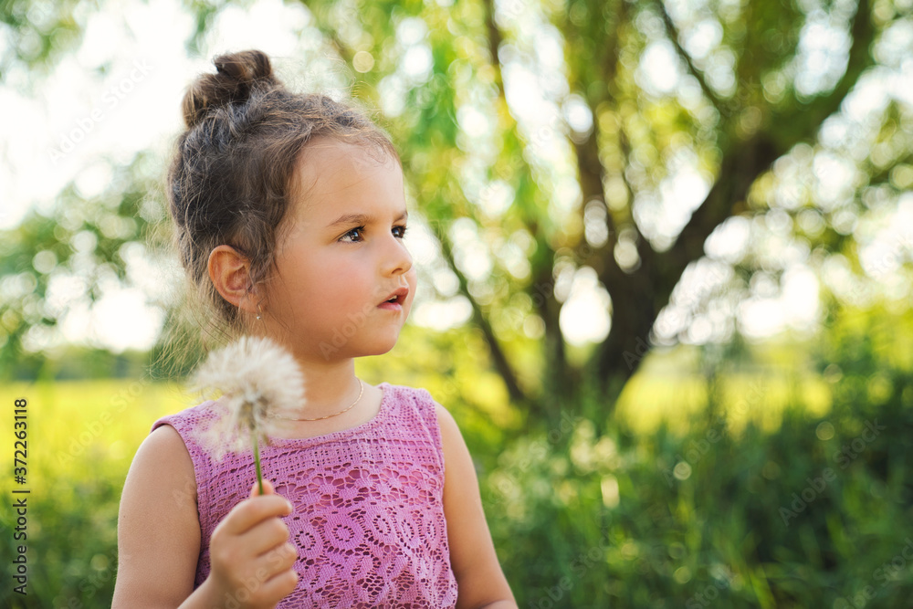 portrait of three years old girl in nature on a sunny day portrait of three years old girl in nature on a sunny day
