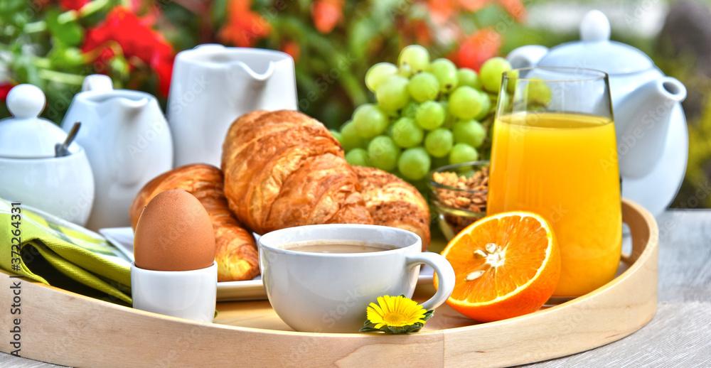 Breakfast served with coffee, juice, croissants and fruits Breakfast served with coffee, juice, croissants and fruits