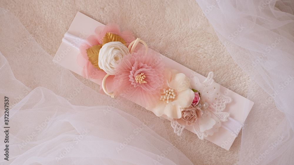A bouquet of flowers made out of fabric cloth textile in beautiful soft pink theme colors placed on card stock paper that can be used as hair accessory, decoration, and embellishment A bouquet of flowers made out of fabric cloth textile in beautiful soft pink theme colors placed on card stock paper that can be used as hair accessory, decoration, and embellishment