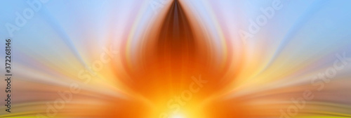 Abstract luminous energetic flower on a multicolored background of rainbow colors.