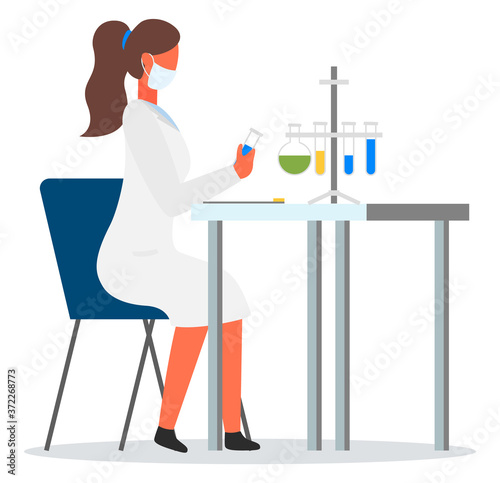 Scientist with flasks sitting at table. Engineer woman wearing face mask and white gown holding tube with sample in hand. Laboratory experiment, research. Lab assistant isolated at white background