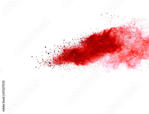 Red dust particle splash isolated on white background.