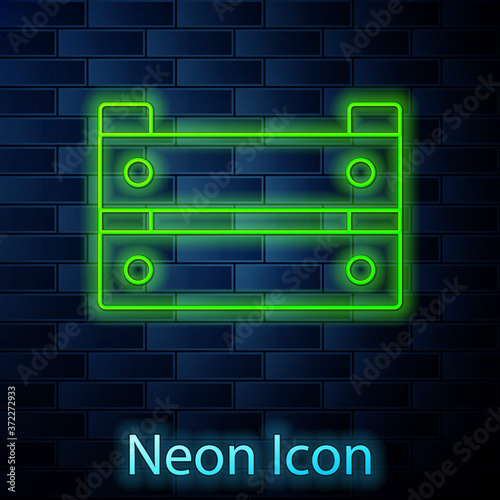 Glowing neon line Wooden box icon isolated on brick wall background. Grocery basket, storehouse crate. Empty wooden container for vegetables, products. Vector.