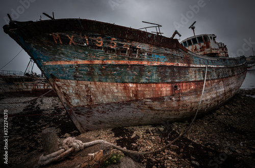 Ship wreck  abandoned boat at the shore at Camaret sur mer  Crozon  Brittany   Bretagne  France.  