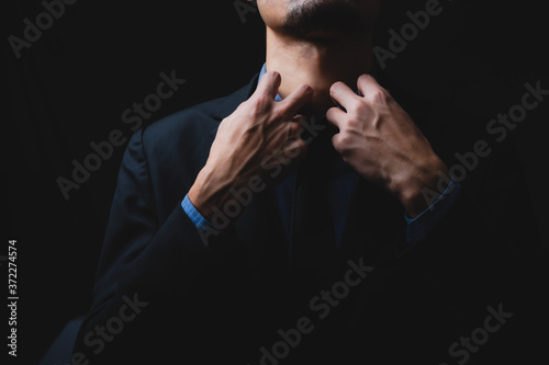Businessmen are tying neckt...