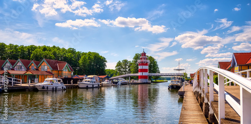 Harbor village Rheinsberg-Brandenburg with traditional houses on a sunny day in summer, Germany photo