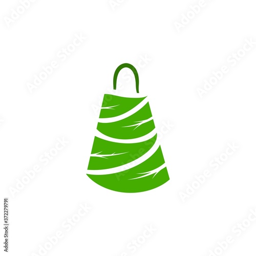 Green shopping bag made of leaves. Reuse or recycle eco package for products or food.