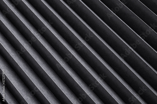 Black striped texture, ribbed metal background