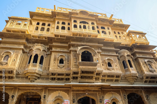 Beautiful details carved facade wall and windows exterior architecture in Nathmal Ji Ki Haveli in Jaisalmer, Rajasthan India. This is Famous Haveli Architecture in Rajasthan.