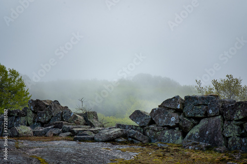 Rock Wall in the fog photo