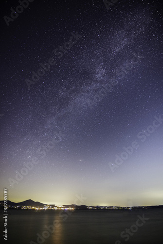 The Heart of Milky Way. View from Mountain with rood on the peak during the night time. Monte Livata. Italy
