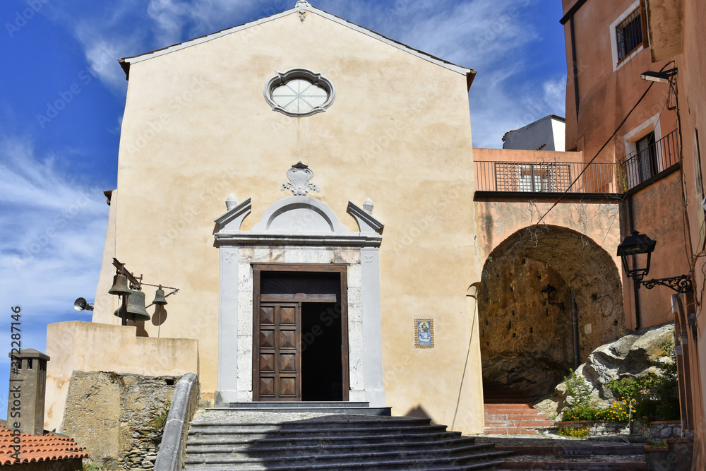 The facade of a small church in Maierà, a rural village in the Calabria region.