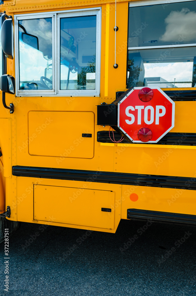 Side view of a school bus stop sign