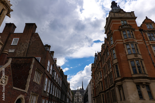 A view of a London street on a cloudy day.