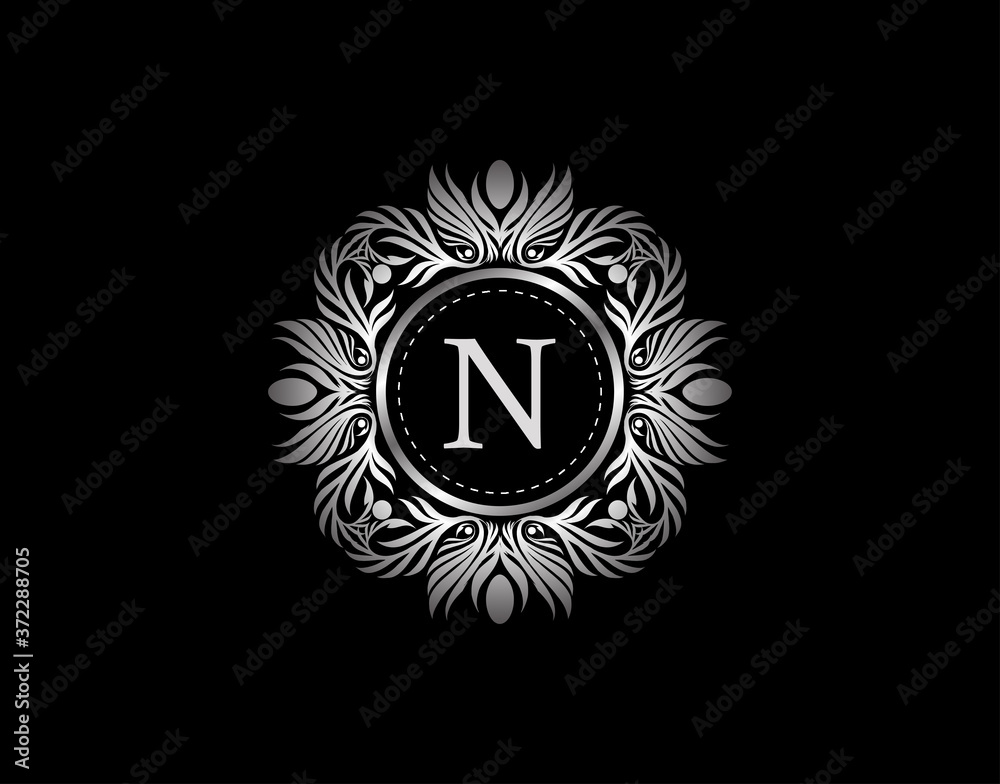 Luxury Silver Badge N Letter Logo. Luxury calligraphic vintage emblem with beautiful classy floral ornament. Vintage Heraldic Frame design Vector illustration.