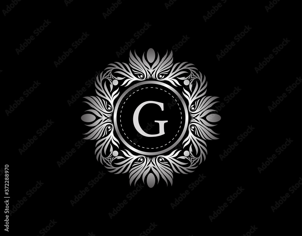 Luxury Silver Badge G Letter Logo. Luxury calligraphic vintage emblem with beautiful classy floral ornament. Vintage Heraldic Frame design Vector illustration. Luxury Silver Badge G Letter Logo. Luxury calligraphic vintage emblem with beautiful classy floral ornament. Vintage Heraldic Frame design Vector illustration.