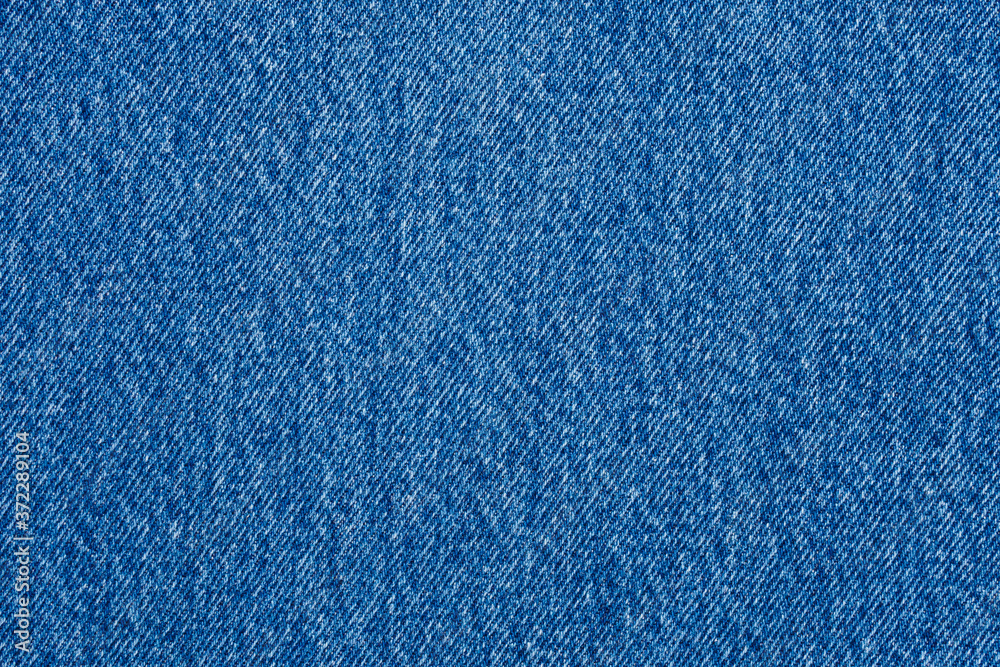 Denim blue jeans texture close up background top view Denim blue jeans texture close up background top view