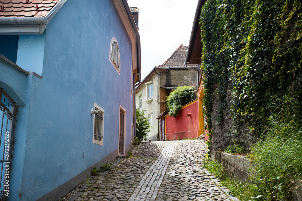 Beautiful colorful street in Sighisoara in typical traditional style. Sighisoara is the place Dracula is born.
