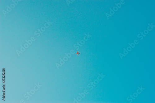 Red plane with blue sky