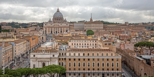 View of St. Peter's Basilica in the Vatican. Rome cityscape with the dome of St. Peter's Basilica - state of religion Christianity, Italy
