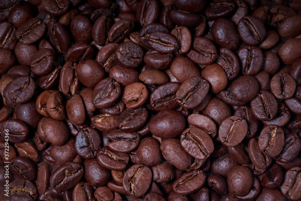 coffee beans close-up on a dark background coffee beans close-up on a dark background