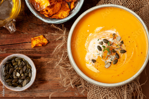 Cream of Pumpkin and sweet potato soup with  seeds.