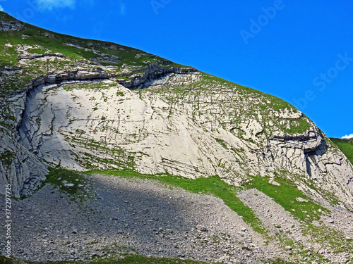 Alpine rock plate Leiteren below the summit Chli Haupt Murmelchopf and over the Aa Alp plateau, Melchtal - Canton of Obwald, Switzerland (Kanton Obwalden, Schweiz) photo