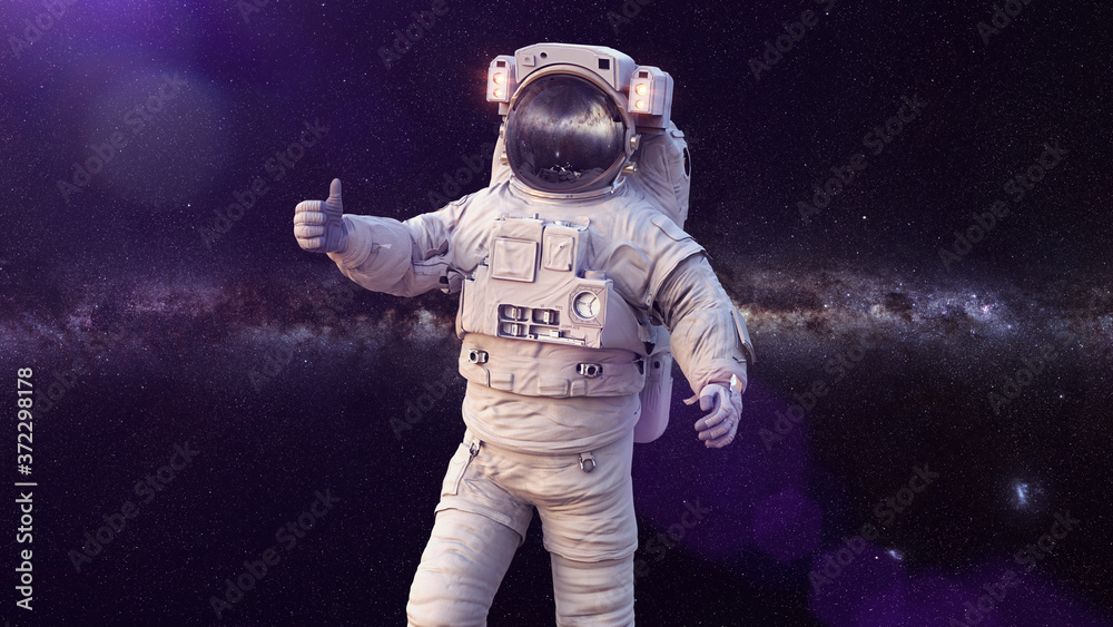 Fototapeta premium astronaut showing thumbs up during spacewalk in empty space