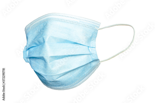 Medical mask taken from left view on isolated white background with clipping. paths to cut objects to modify