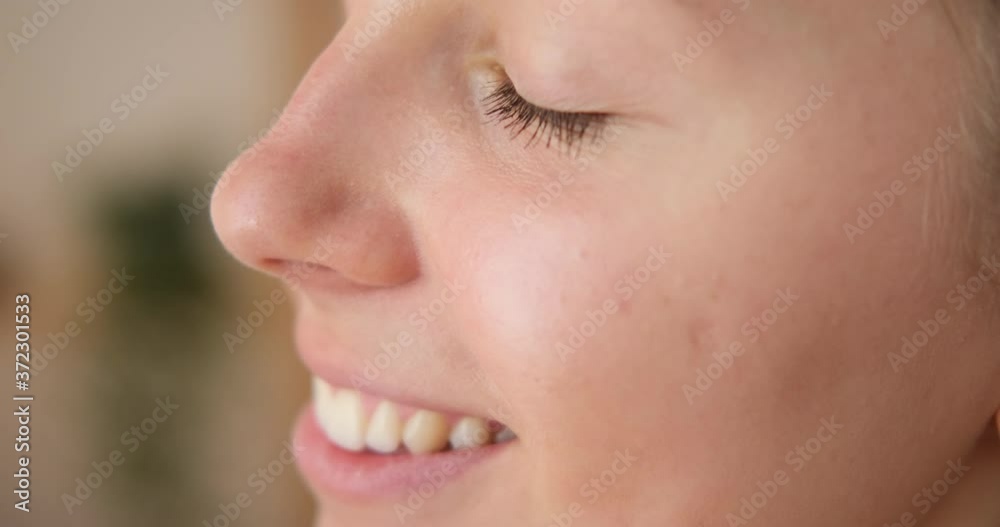 Face of beautiful young woman smiling Face of beautiful young woman smiling