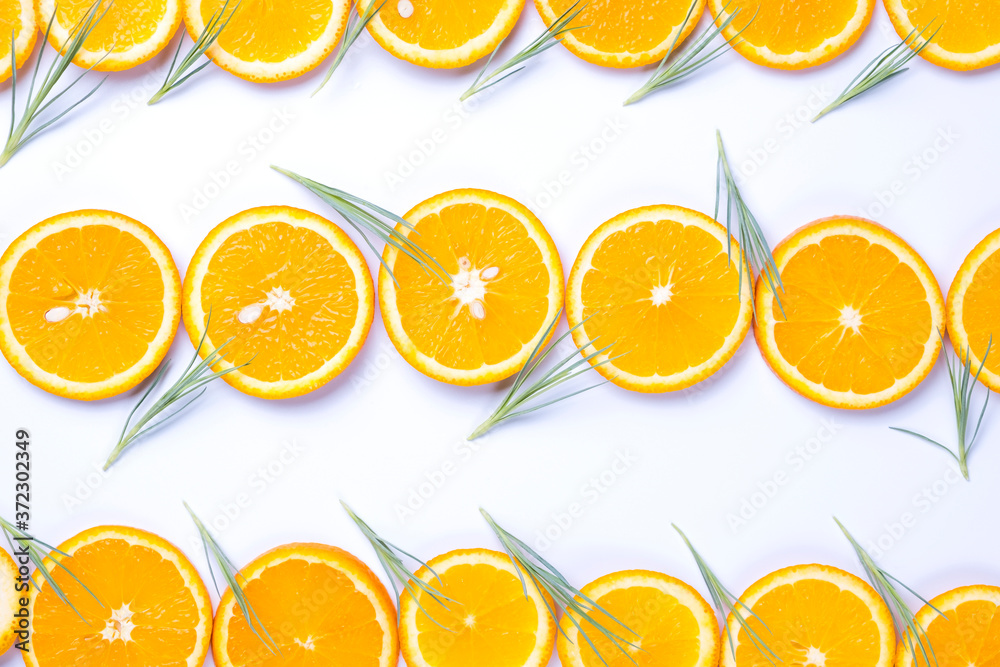 Flat lay view of orange and lemon slices on white backround. Flat lay view of orange and lemon slices on white backround.