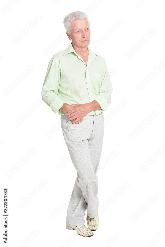 Full length portrait of senior man posing isolated on white background Full length portrait of senior man posing isolated on white background
