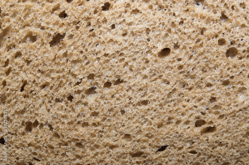 Texture of crumb of rye-wheat freshly baked bread Texture of crumb of rye-wheat freshly baked bread