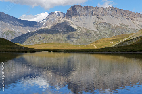 Reflections on a mountain lake of Parc de la Vanoise, in french Alps