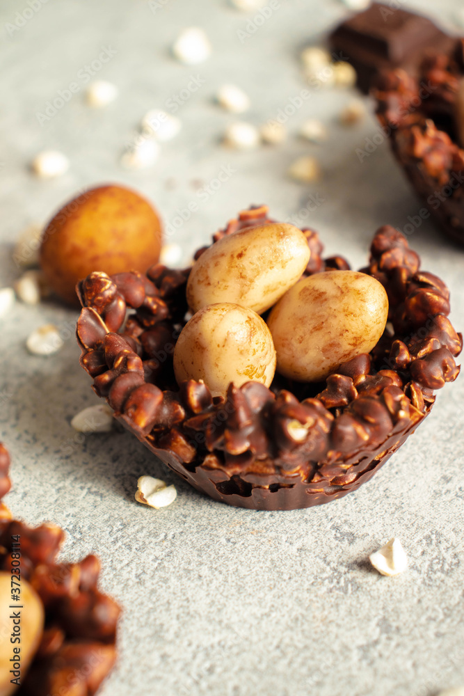 Fototapeta premium Easter egg nests - Chocolate vegan desserts - chocolate and nuts