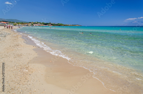 Picturesque golden sandy beach in Tsilivi situated on the east of Zakynthos island on Ionian Sea, Greece. photo