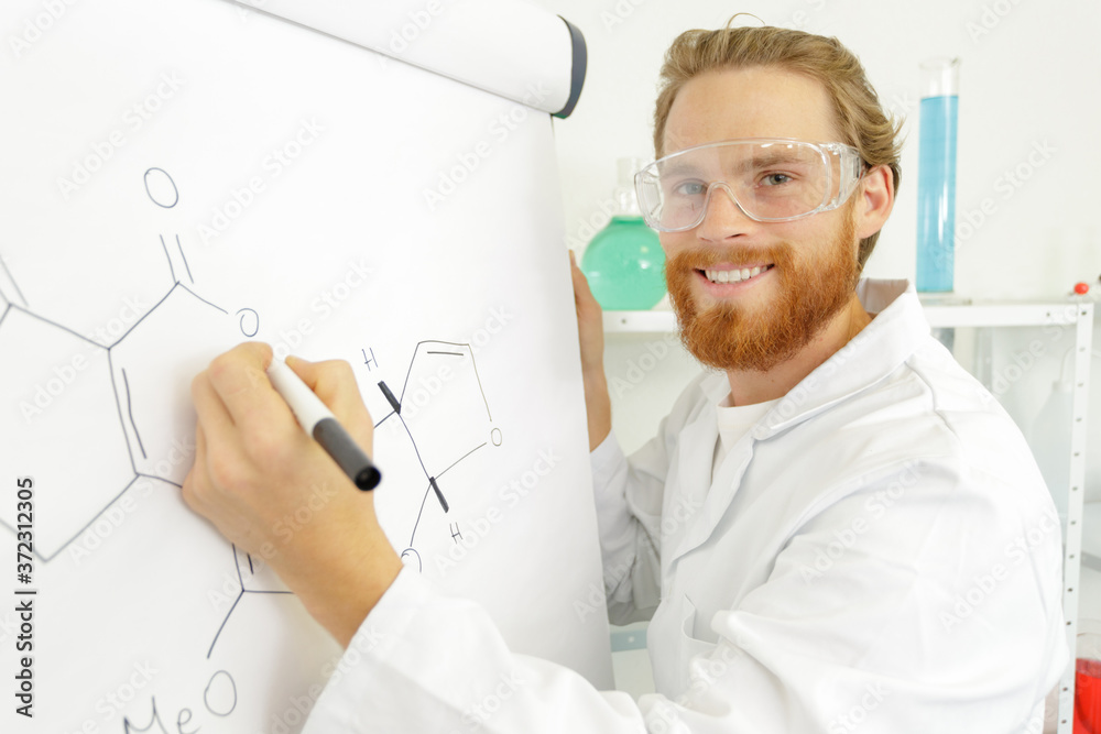 handsome young man celebrating success on formula handsome young man celebrating success on formula