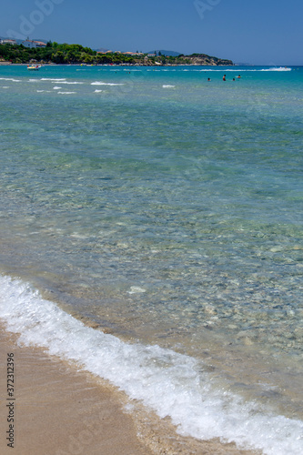 Picturesque golden sandy beach in Tsilivi situated on the east of Zakynthos island on Ionian Sea, Greece. photo