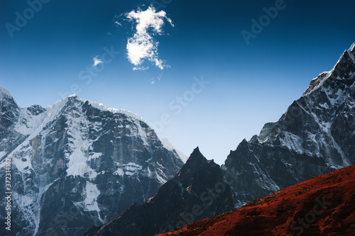 View of Cholatse mount in Himalaya mountains at sunset. Thokla pass, Khumbu valley, Everest region, Nepal.