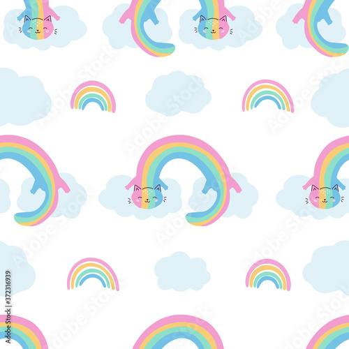 Childish seamless pattern with funny rainbow cats on clouds. Fantasy vector character for children. Hand drawn sky illustration.