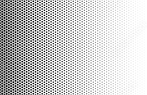 Vector halftone dots background. Black and white comic pattern.
