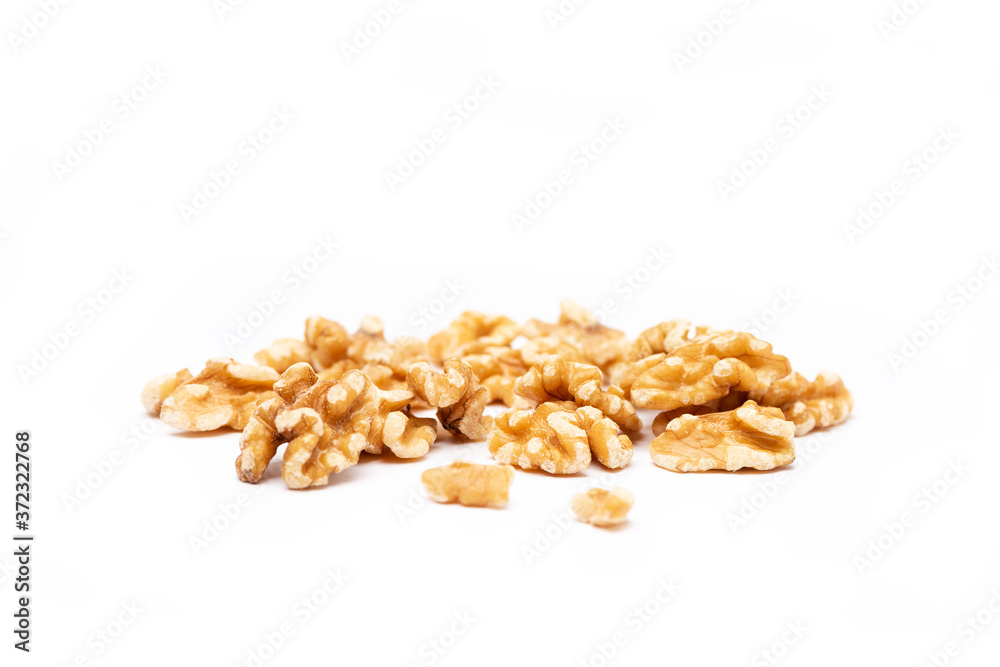 Peeled walnuts on a white background Peeled walnuts on a white background