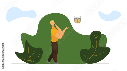 Man talking smartphone picks up the parcel delivered by the drone. Drone delievery concept.